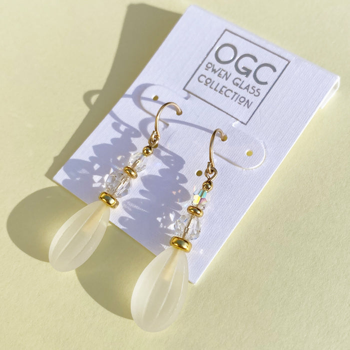 Frosted white earrings with gold trim from Owen Glass Collection, featuring a sleek and elegant design.