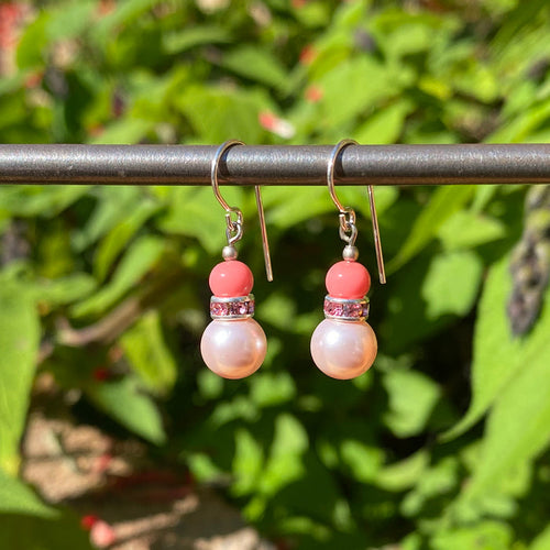 Pale pink crystal pearl earrings with rhinestone accents from Owen Glass Collection, featuring 48-inch bells design.
