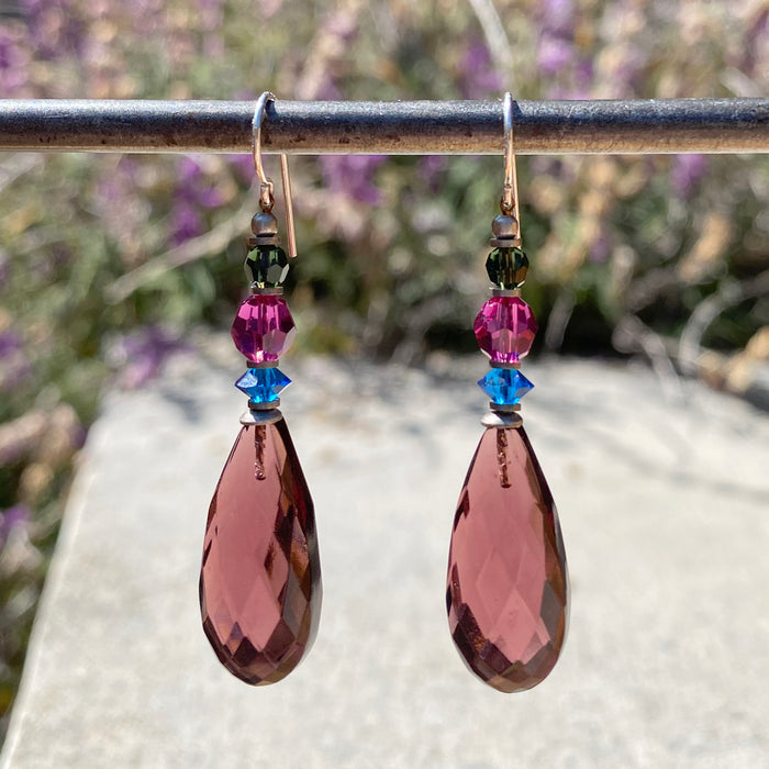 Owen Glass Collection Cabaret 9-inch amethyst glass dangle earrings with elegant, faceted purple glass.