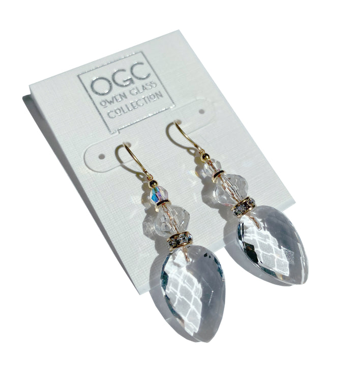 Owen Glass Collection Cruise 16-inch clear crystal and gold dangle earrings with elegant, shimmering design.