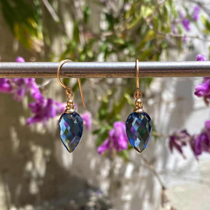 Harlequin 7 indigo glass and gold earrings from Owen Glass Collection, featuring intricate glass design with gold accents.