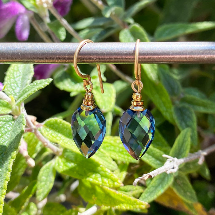 Owen Glass Collection Harlequin 7 indigo glass and gold earrings with geometric design and intricate detailing.