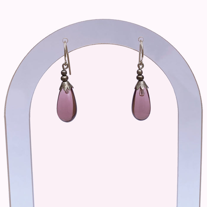Silver Brights 60-inch light amethyst glass earrings from Owen Glass Collection featuring elegant, translucent purple glass drops.